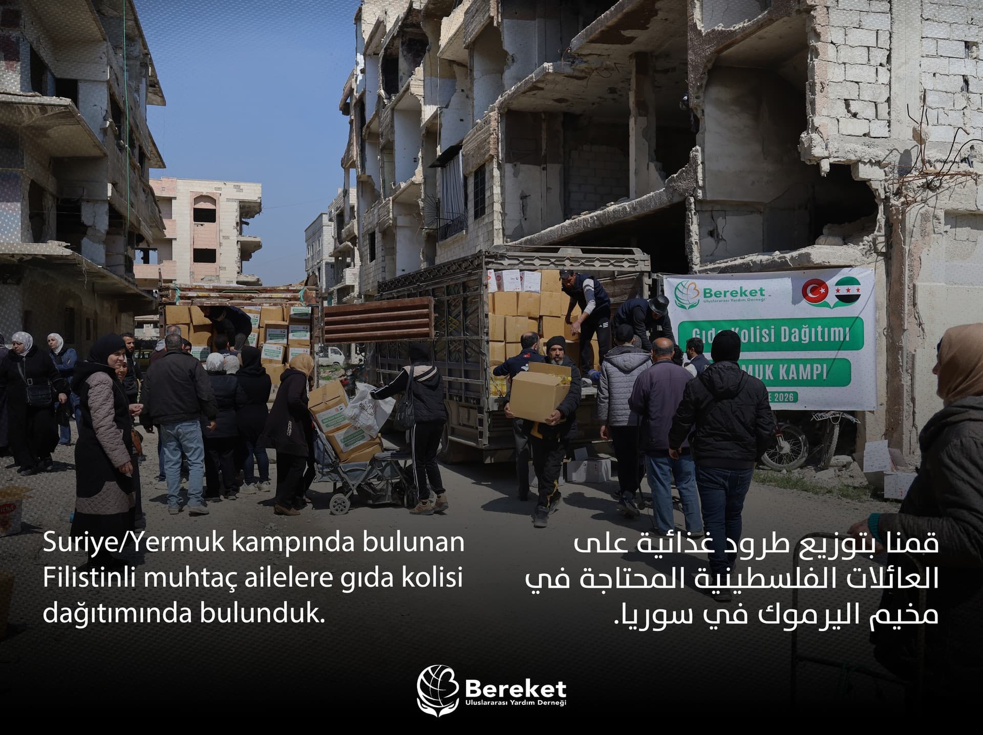 Distributing food parcels to needy Palestinian families in Yarmouk camp